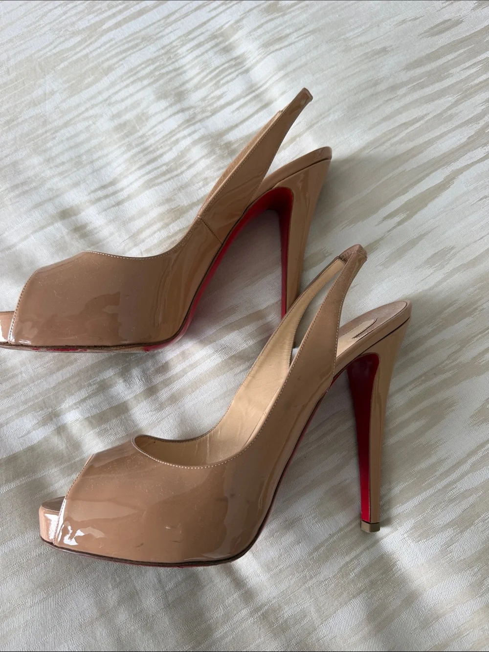 Christian Louboutin glossy beige